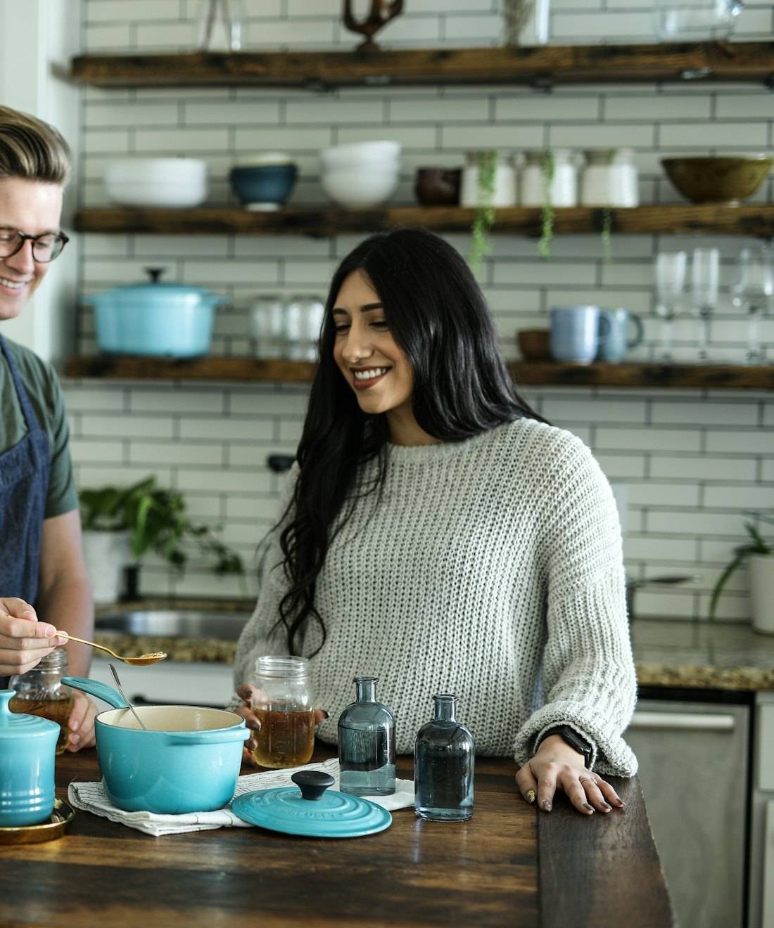 A team cooking together in a kitchen