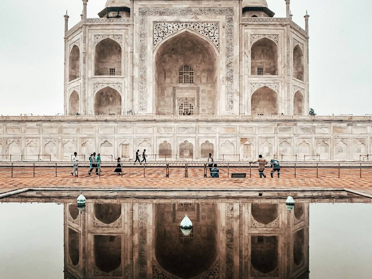 The Taj Mahal reflected in still water