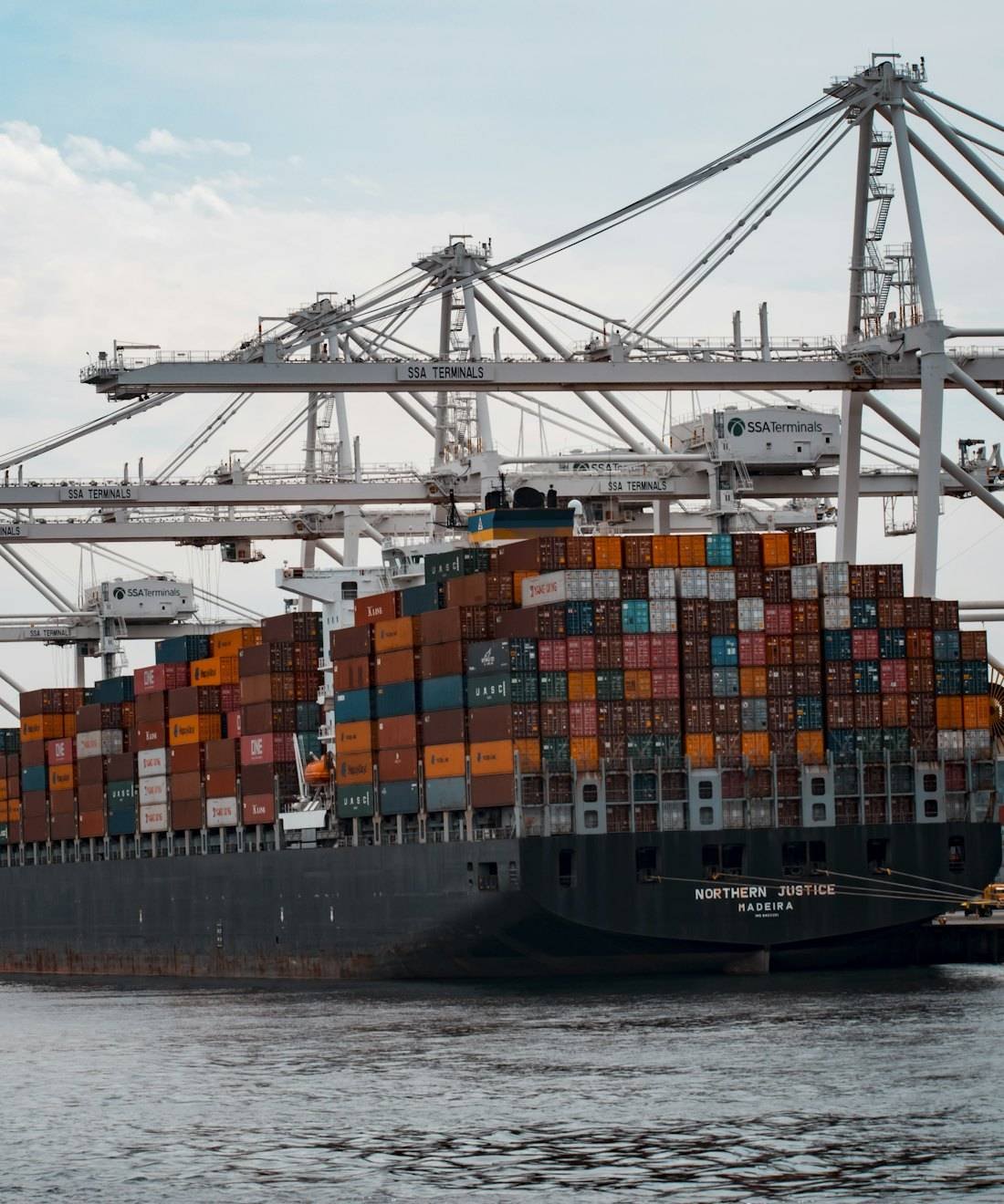 A container ship being loaded at a port